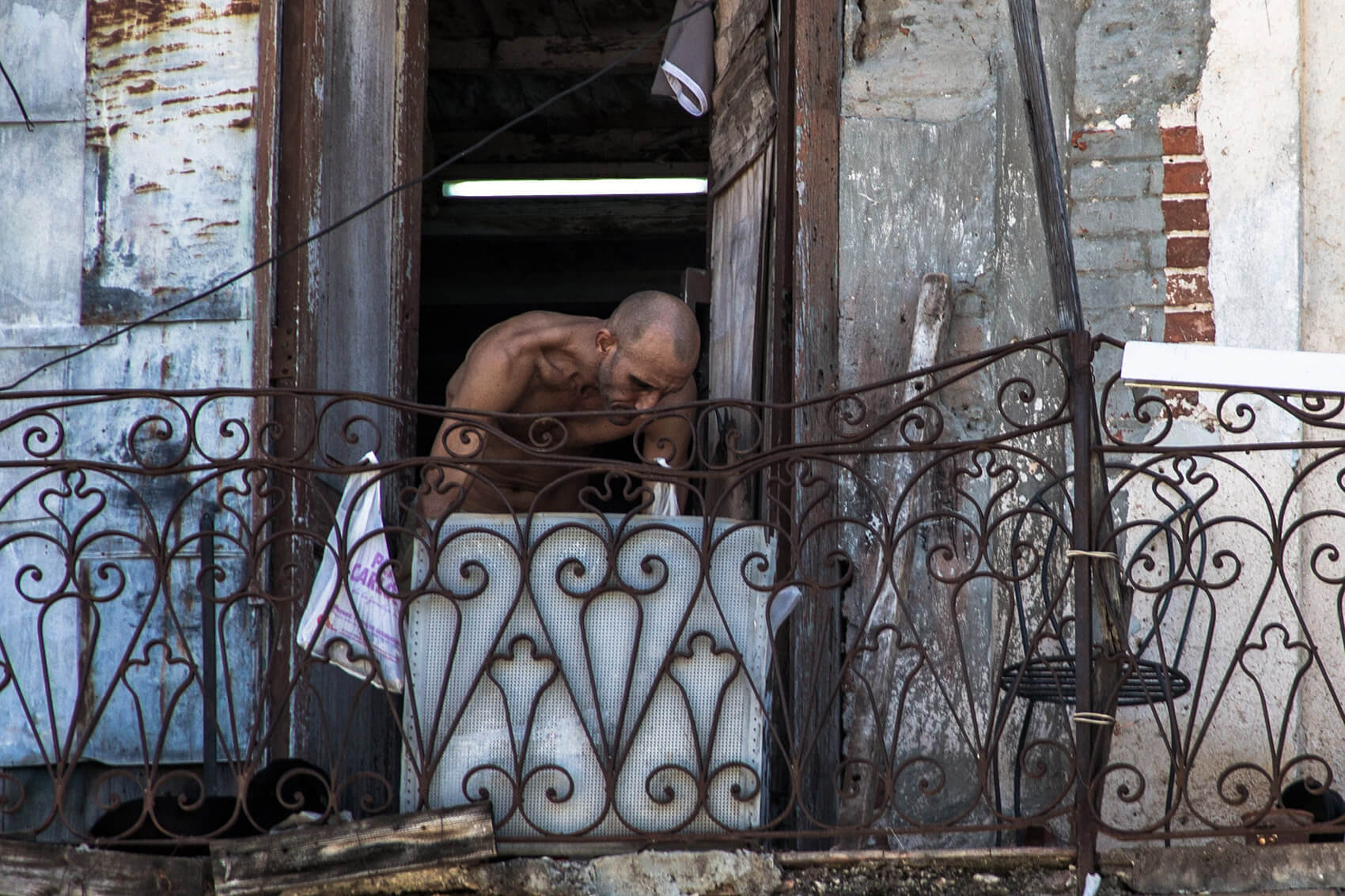 A man on his balcony in Havana
